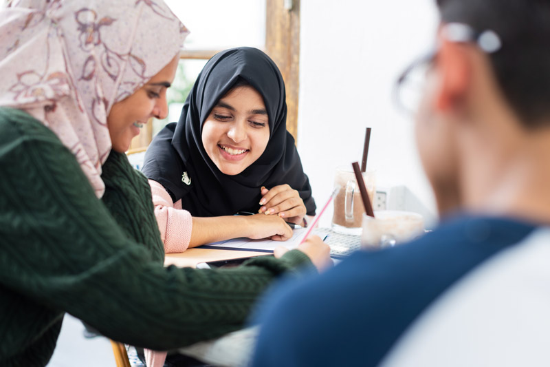Young afghan muslim women learning English in Hereford through Gulab Sorkh Foundation partnership with MEP
