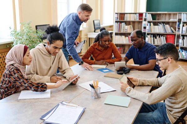 Adult learners from migrant communities taking part in an ESOL and employability training session supported by Newport City Council and Minerva Elite Performance.