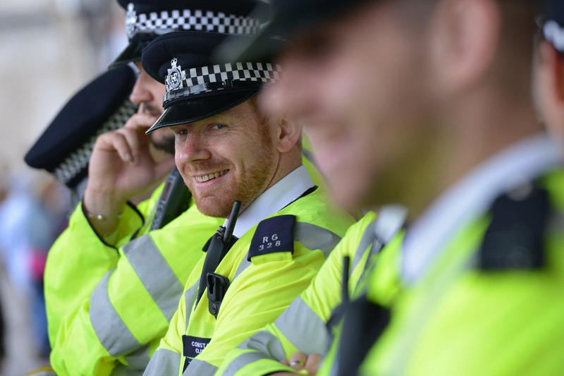 Police officers in high-visibility jackets representing frontline services during professional training and development for military and bluelight teams.